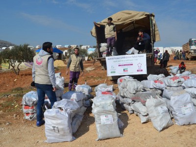 توزيع البيرين في مخيم حربنوش ل350 عائلة
